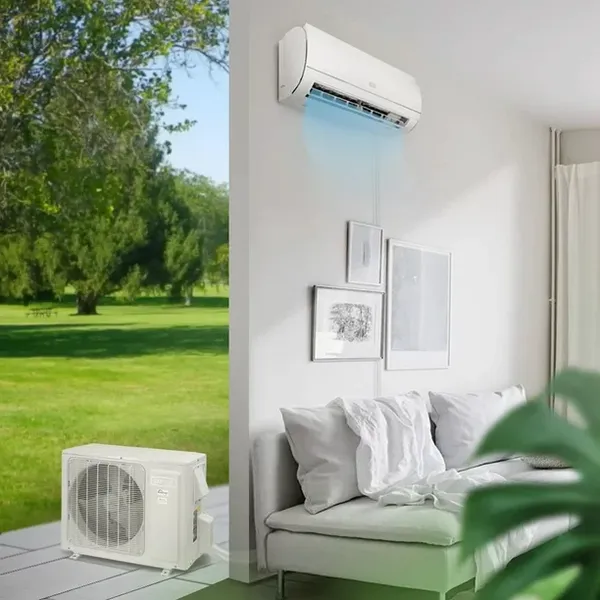 Technician servicing an outdoor ductless mini-split unit
