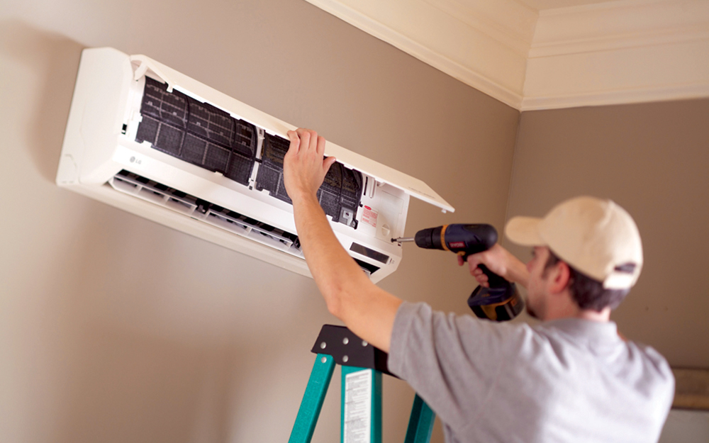 Technician installing a ductless mini-split